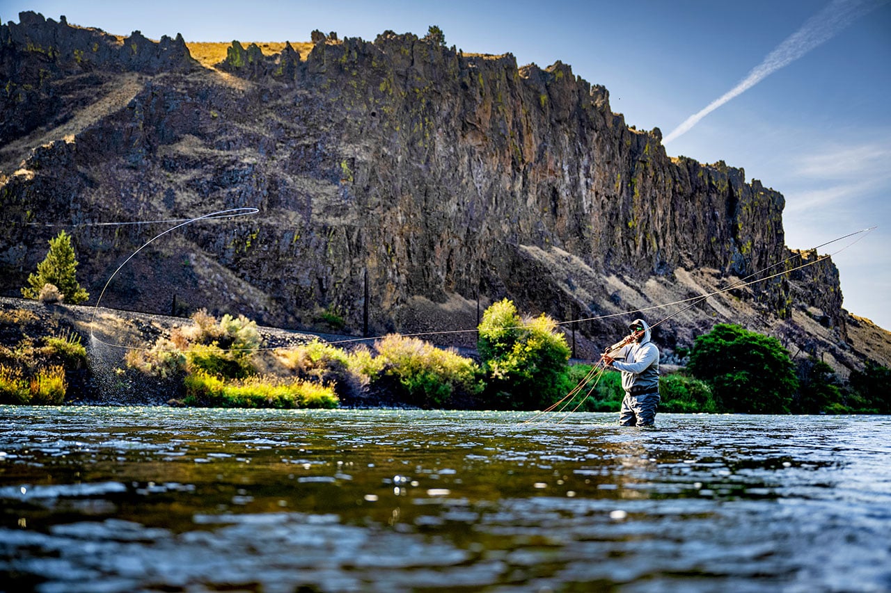 Fly fisher casting on the Deschutes