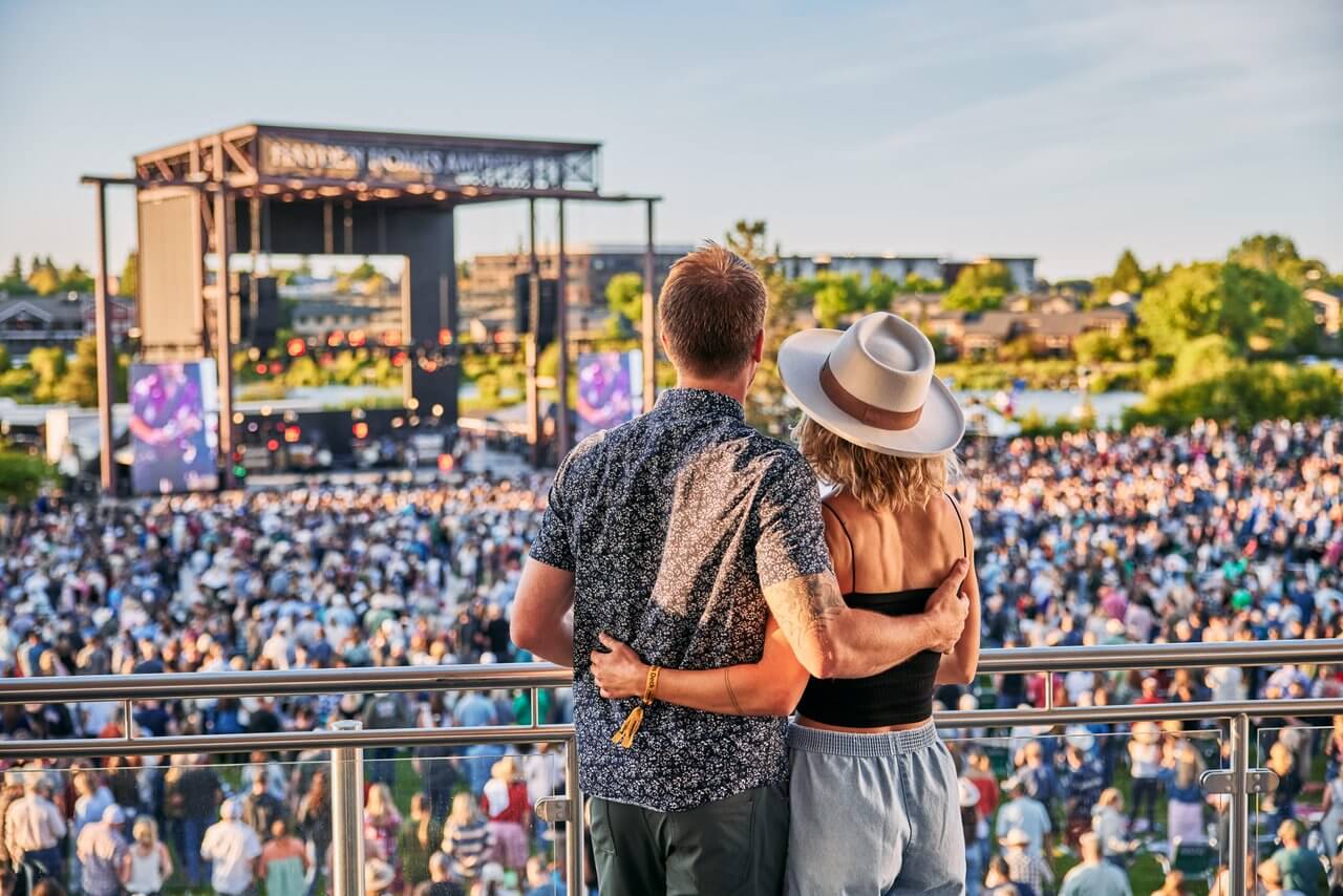 Couple enjoying a concert at the amphitheater