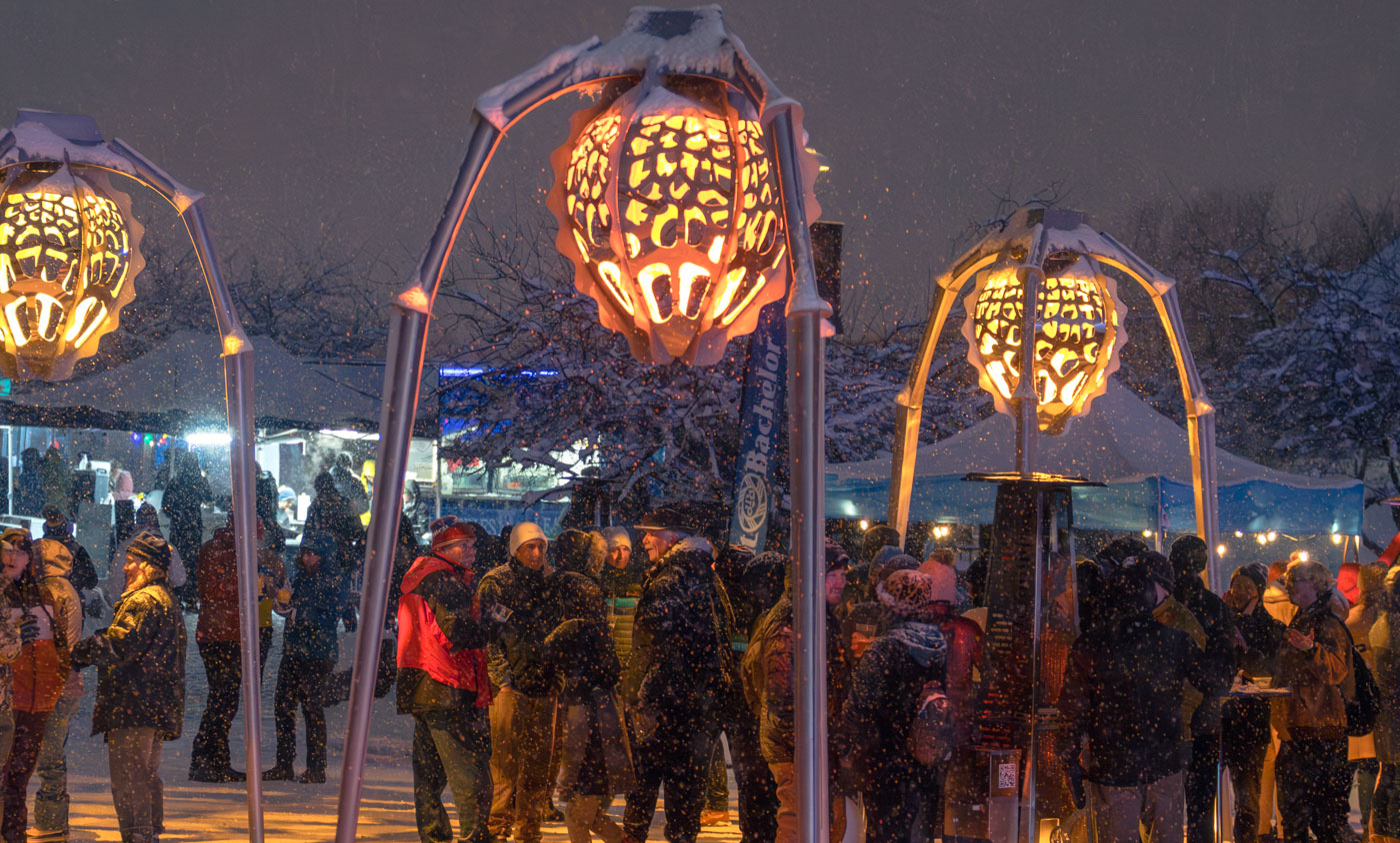 WinterFest glow — snowy streets and warm lights in Bend